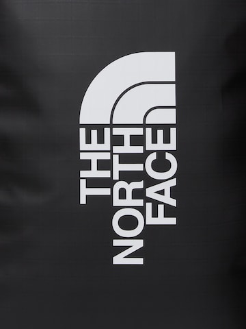 THE NORTH FACE Βαλίτσα με ροδάκια 'VOYAGER 21' σε μαύρο