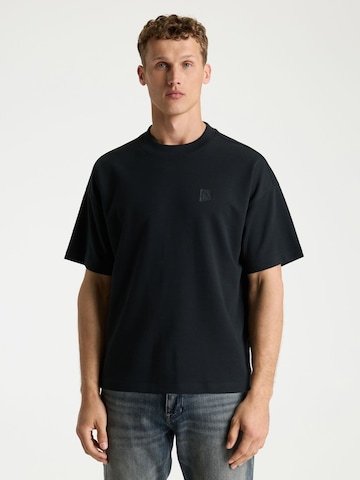 T-Shirt CHASIN' en noir : devant