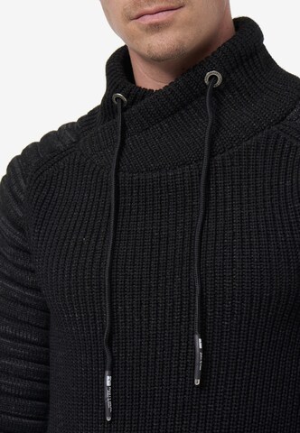 Rusty Neal Pullover in Schwarz