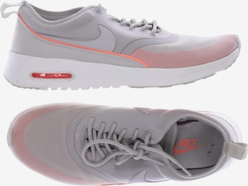 NIKE Sneakers & Trainers in 40,5 in Grey: front