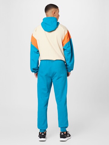 Effilé Pantalon 'Adventure' ADIDAS ORIGINALS en bleu