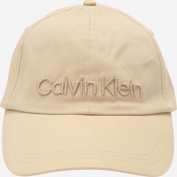 Calvin Klein غطاء بلون بيج