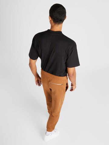 Effilé Pantalon 'AIR' Jordan en marron