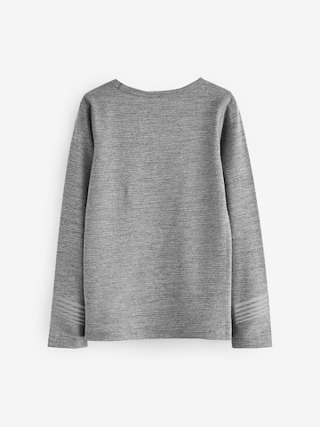Next Baselayer in Grau