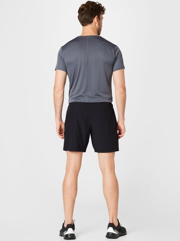 ASICS Regular Sports trousers 'Core' in Black