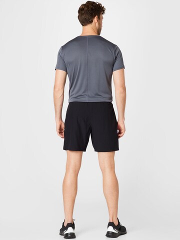 ASICS Normální Sportovní kalhoty 'Core' – černá