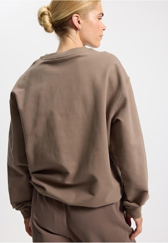 Sweat-shirt 'One' rethinkit studios en marron