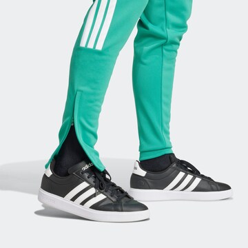 ADIDAS SPORTSWEAR Tapered Sportbyxa 'House Of Tiro' i grön