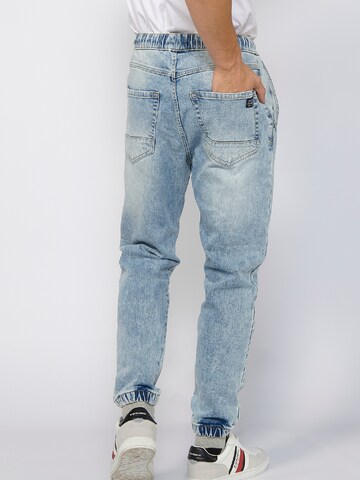 KOROSHI Tapered Jeans in Blau