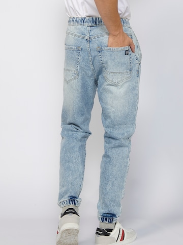 KOROSHI Tapered Jeans in Blau