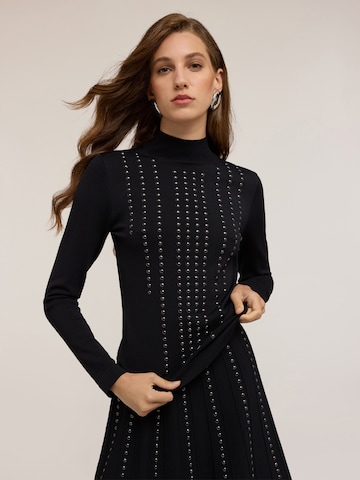 Pull-over MOTIVI en noir : devant