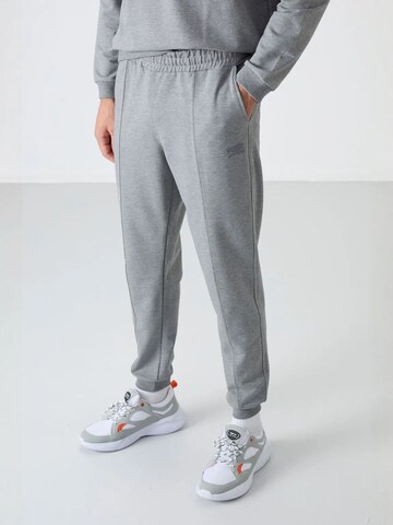 Tuta da jogging di Tommy Life in grigio