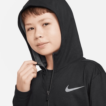 NIKE - Sudadera con cremallera deportiva 'Poly' en negro