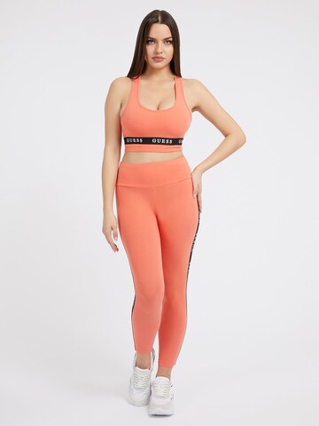 GUESS Skinny Workout Pants in Orange