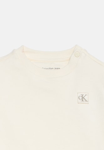 Calvin Klein JeansKomplet - bež boja: prednji dio