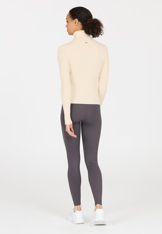 Athlecia Trui in Beige