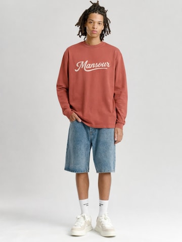 Mansour Shirt 'Swoosh'‌‌‌‌‌‌‌ in Rot: Vorderseite
