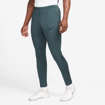 NIKE Slim fit Workout Pants 'Academy 23' in Green: front