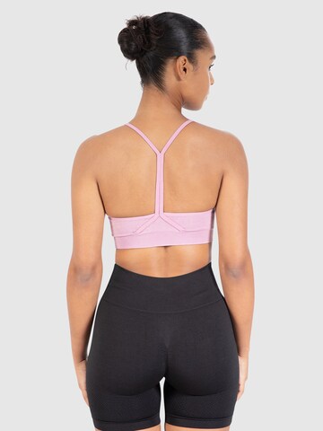 Bustier Soutien-gorge de sport 'Batik Scrunch' Smilodox en rose