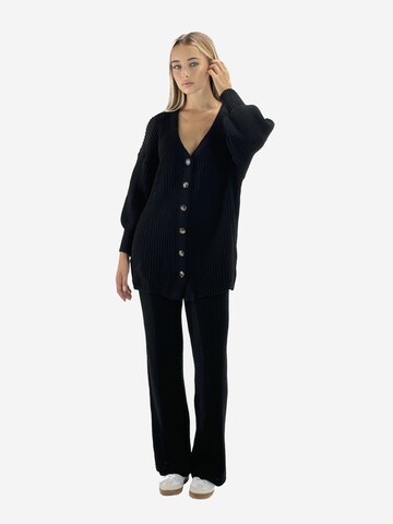 Elara Huispak in Zwart: voorkant