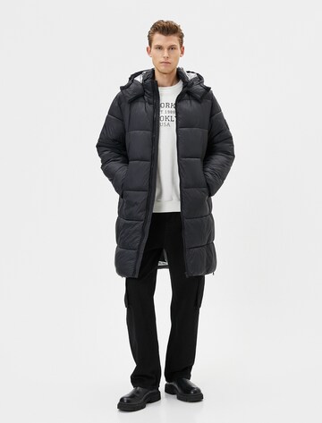 Koton Between-Seasons Coat in Black: front