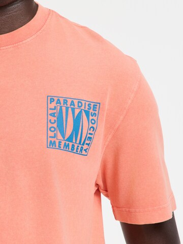 Tricou 'Finn Paradise Block' de la Shiwi pe portocaliu