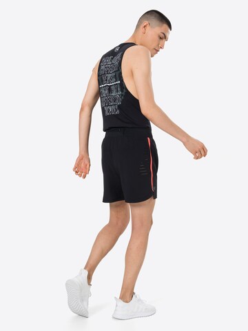 UNDER ARMOUR - regular Pantalón deportivo 'SpeedPocket' en negro