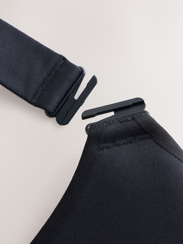 Bustino Reggiseno sportivo 'Zero Bounce' di Next in nero