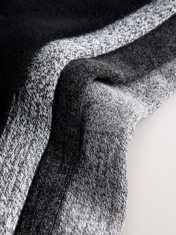 Next Zokni - szürke