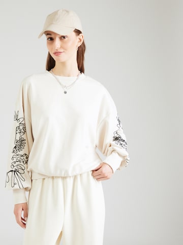 ONLYSweater majica 'ONLBROOKE' - bež boja: prednji dio