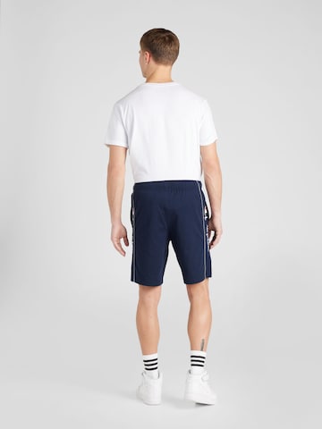 Regular Pantaloni de la Champion Authentic Athletic Apparel pe albastru