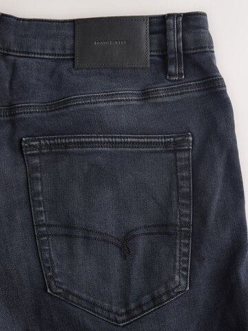 Coupe slim Jean 'Motionflex' Next en mélange de couleurs
