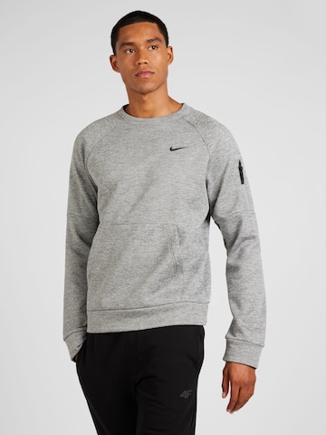 NIKE Sportsweatshirt i grå: forside