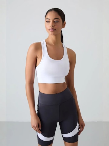 Haut de sport Tommy Life en blanc