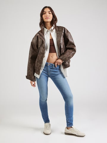 WRANGLER Skinny Džíny – modrá