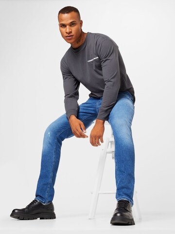 Tommy Jeans Bluser & t-shirts i grå