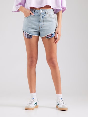 ADIDAS ORIGINALS - Slimfit Vaquero 'Adidas x Jeremy Scott' en azul: frente