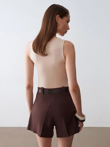 Dilvin Wide leg Trousers in Brown