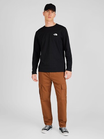 THE NORTH FACE T-shirt i svart