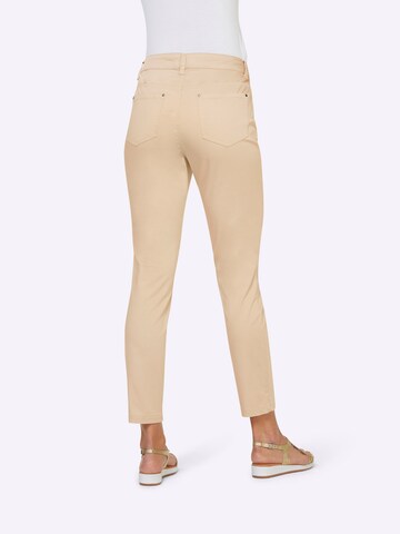 heine - Slimfit Calças chino em bege