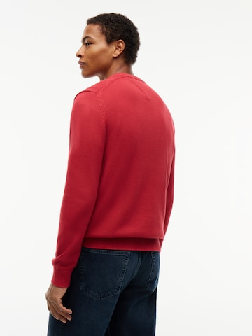 Pull-over 'ESS' Tommy Jeans en rouge : derrière