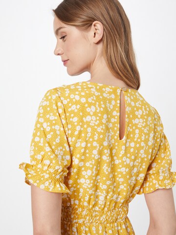 Robe 'CORINA' Louche en jaune