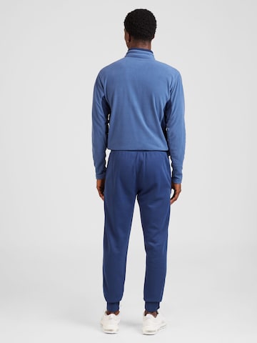 Champion Authentic Athletic Apparel Tapered Nadrág - kék