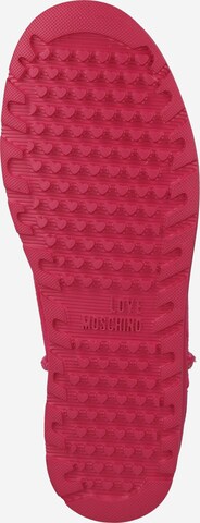 Après-ski Love Moschino en rose