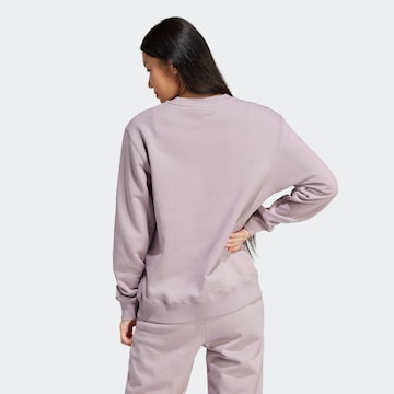 ADIDAS SPORTSWEAR - Sweatshirt de desporto 'Essentials Linear' em roxo