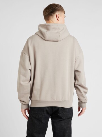 ABOUT YOU Collegepaita 'Malik Hoodie' värissä beige