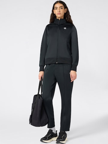 juoda Champion Authentic Athletic Apparel Treniruočių kostiumas: priekis