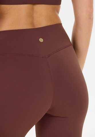 Athlecia Skinny Workout Pants 'Luxe' in Red