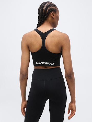 Bustino Reggiseno sportivo 'Pro' di NIKE in nero