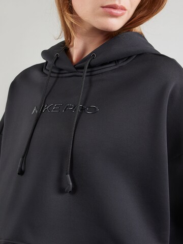 NIKE Urheilullinen collegepaita värissä musta